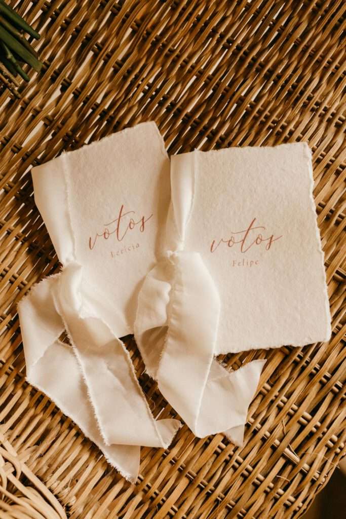 Handmade Paper Postcards on Straw Background
